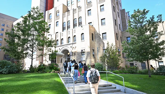 Students head into the Allan Rosenfield Building on the first day of classes. 