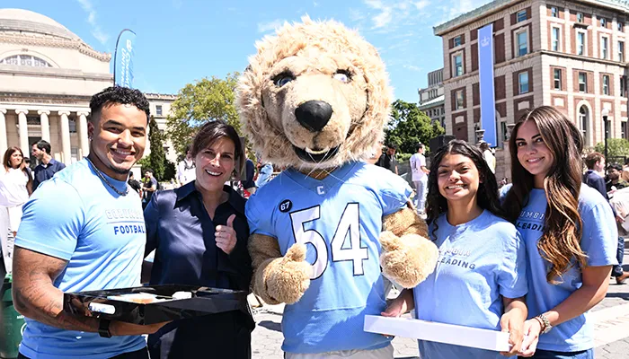 Roar-ee, Columbia athletes, and CLaire Shipman with treats. 