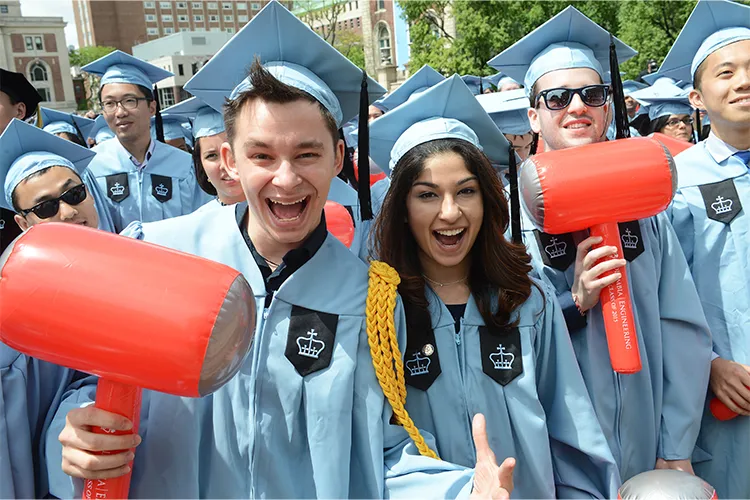 Columbia Engineering student wearing a yellow cord signifying Senior Marshal status