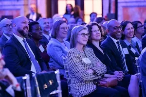 University leaders listening to George Stephanopoulos and President Mnookin in conversation. Photo by Diane Bondareff.