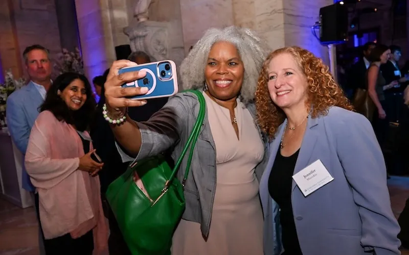 Many alumni took selfies with President Mnookin. Photo by Diane Bondareff.