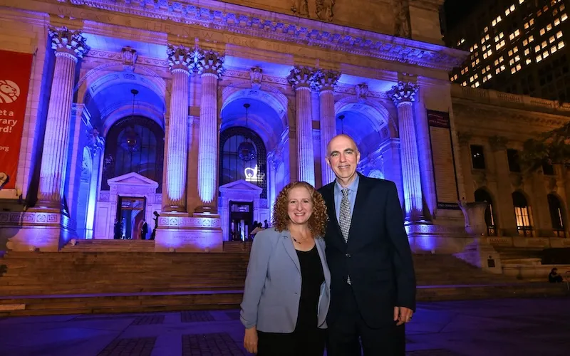 President Mnookin and her husband, Professor Joshua Foa Dienstag, in front of the New York Public Library. Photo by Diane Bondareff.