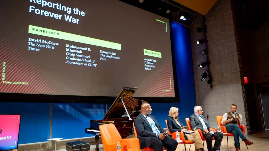 Four people on seated a stage during a panel on journalism at the ‘Forever War and the First Amendment” symposium at Columbia University. Photo by Siobhan Mullan.