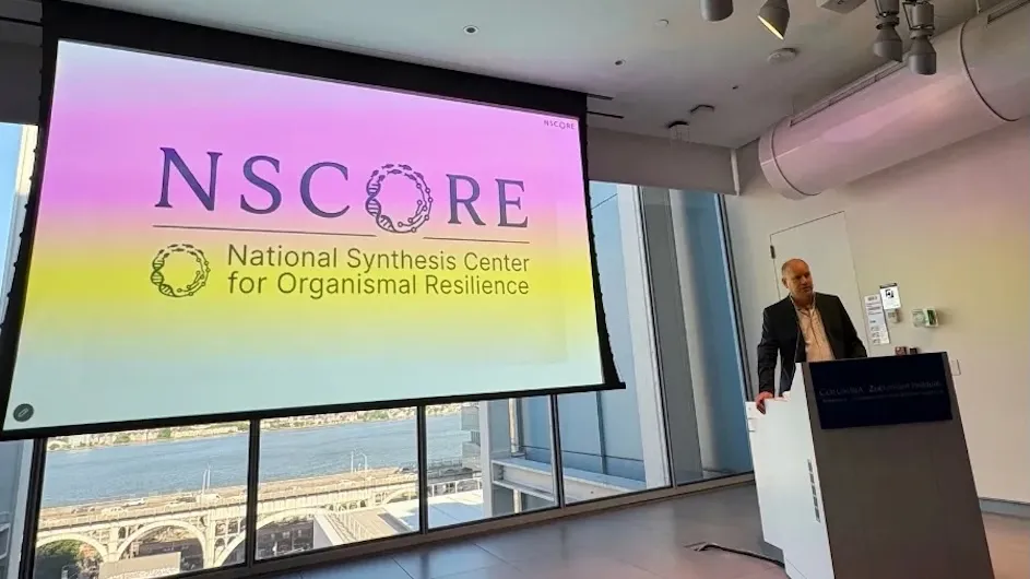 Dustin Rubenstein speaks at the NSCORE symposium.