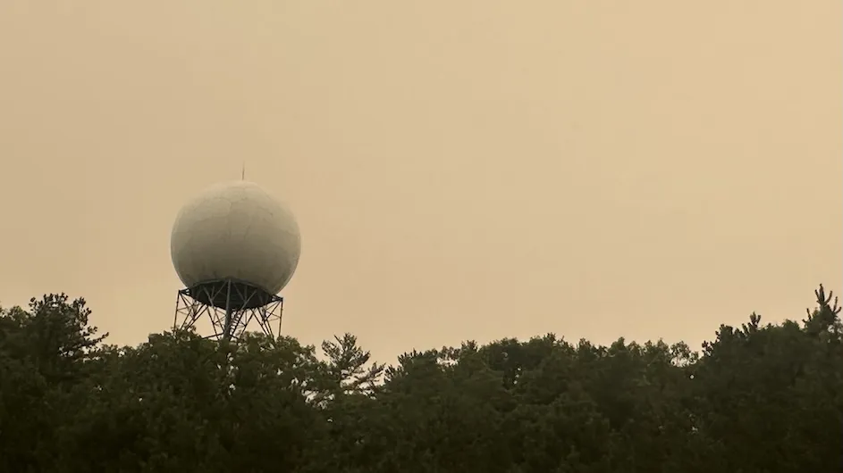 Photo from the National Weather Service office on July 15 in Upton, New York, with the sky obscured by a thick layer of smoke. (Credit: NWS Forecast Office New York, NY via Wikimedia Commons)