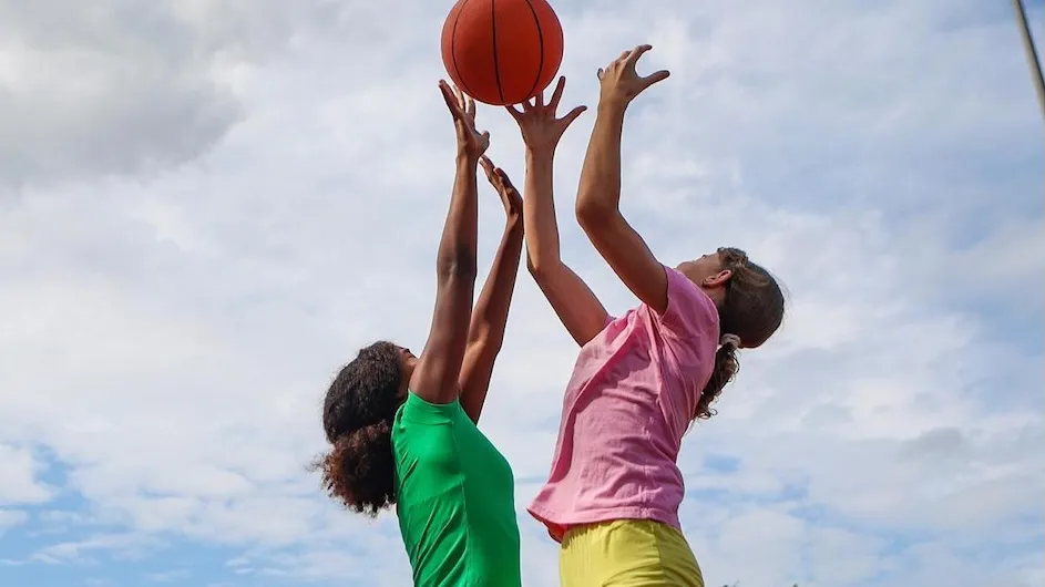 Young people playing basketball