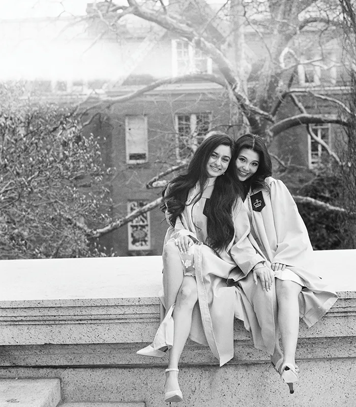 Anna Pan and friend on low steps