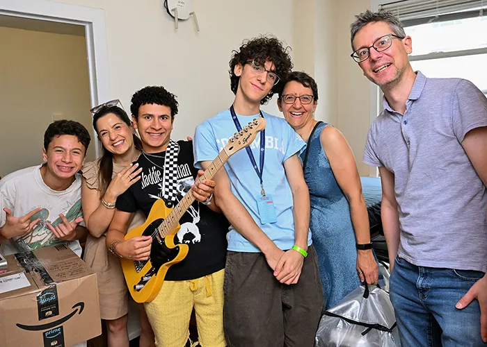 A student moves in to his dorm