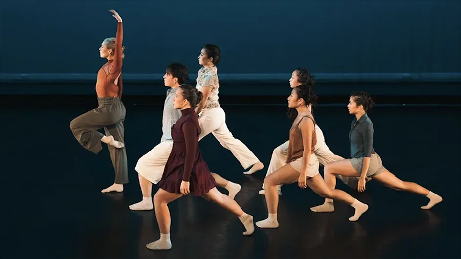 Seven Columbia student dancers from the Columbia Ballet Collaborative on stage.