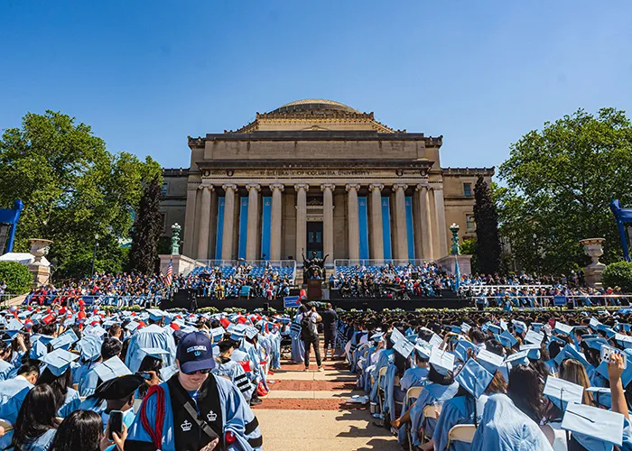 The crowd looks toward Low Library