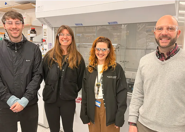 Daniel Allalemdjian, right, poses with students he works with as part of the Campus as Lab initiative. 