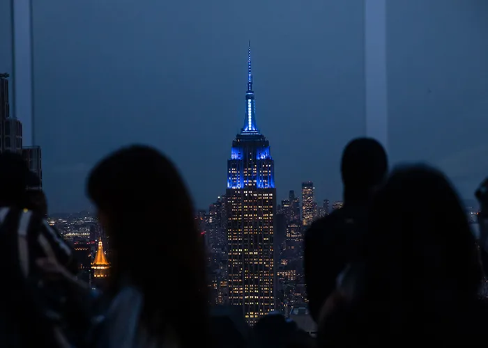 The Empire State Building glows Blue