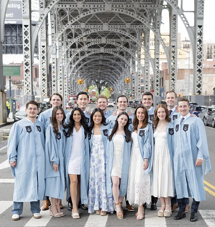 Columbia Business School grads under the Manhattanville Viaduct.