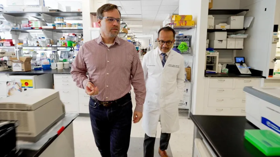 Kenneth Olive, left, led early research into KRAS inhibitors, including preclinical work for daraxonrasib. Based on Olive's findings, Gulam Manji (right) led the Phase 3 clinical trial for daraxonrasib at Columbia with unprecedented results.