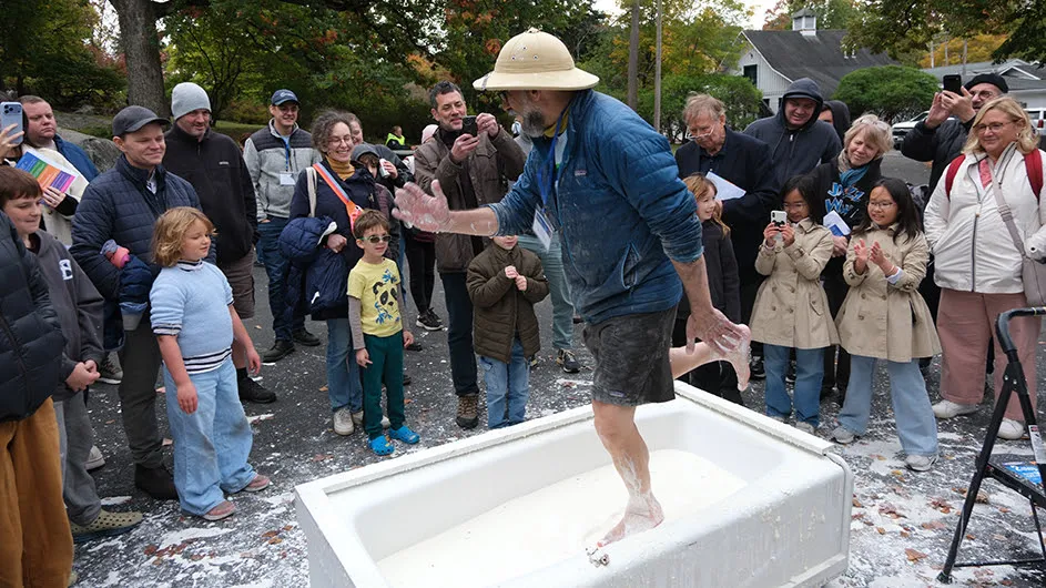 Lamont geophysicist Marc Spiegelman performs his signature “oobleck dance” and runs across its surface to demonstrate its properties. Photo: Bruce Gilbert