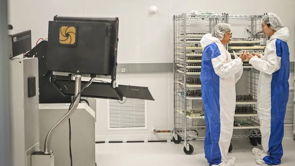 Researchers in Nevis’s cleanroom.