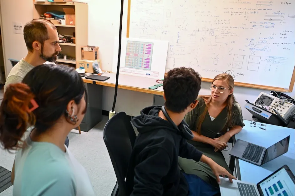 Postdocs, students and staff at work in the lab of Nevis deputy director John Parsons. Parsons and members of his lab design and assemble equipment that is then shipped to Switzerland and used at the Large Hadron Collider at CERN, in Geneva, the world’s largest particle accelerator