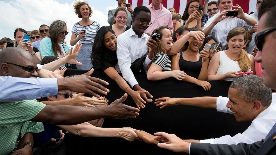 President Barack Obama greets audience members after he delivered remarks on the economy at the Georgetown Waterfront Park in Washington, DC, on July 1, 2014. Photo by Pete Souza