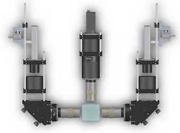 An image of a compact, projector-based light-sheet microscope (pLSM) with a SCOPE device attached to it.