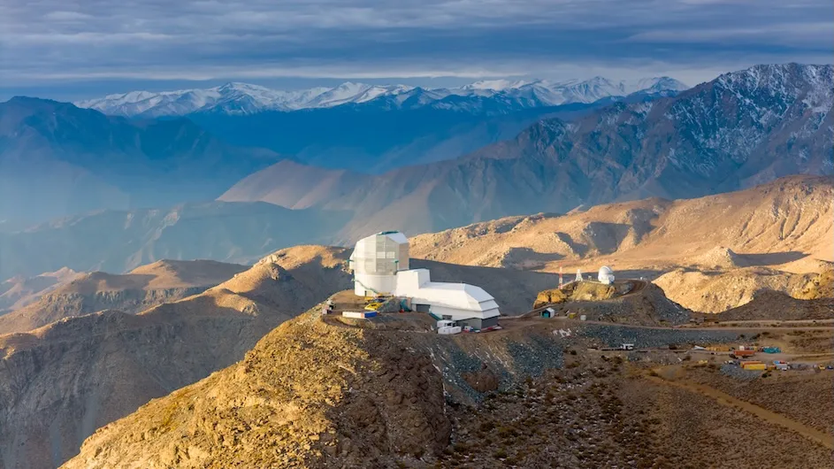 View of Rubin Observatory at sunset in May 2024, on Cerro Pachón in Chile. (Olivier Bonin/SLAC National Accelerator Laboratory)