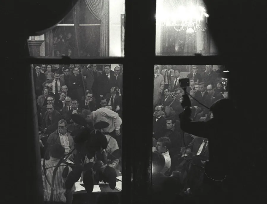 Mob of people outside a window