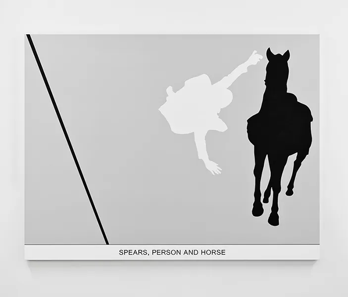 Shadows of a man falling off a horse