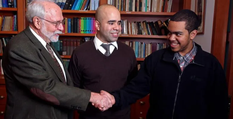 Pictured: Founder of Double Discover Center Roger Lehecka, new Executive Director Joseph Ayala, and student Jonathan Mangual. Photo credit: Bruce Gilbert.