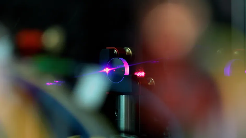 A laser shining through an optical element (Will Lab/Columbia University)