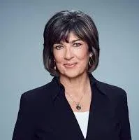 Woman with dark hair smiling