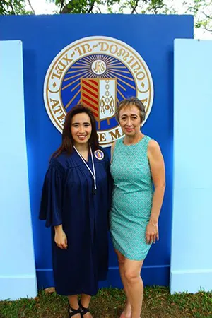 Jemima Mendoza at her undergraduate graduation with her mother.