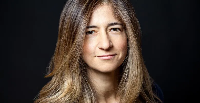 Headshot of Frances Negron-Muntaner on a black background