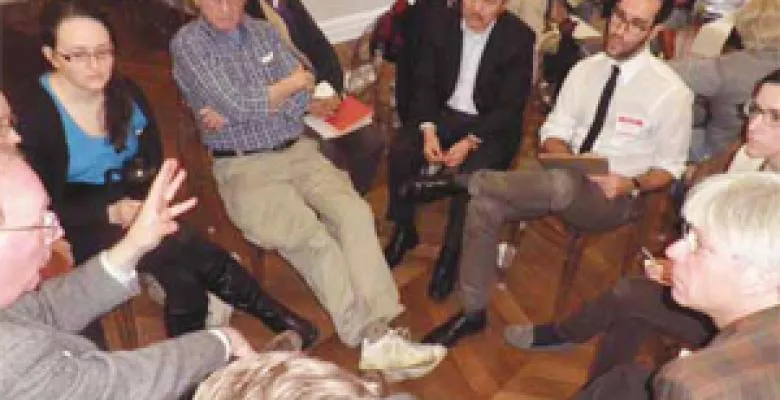 Group of individuals sitting in a circle
