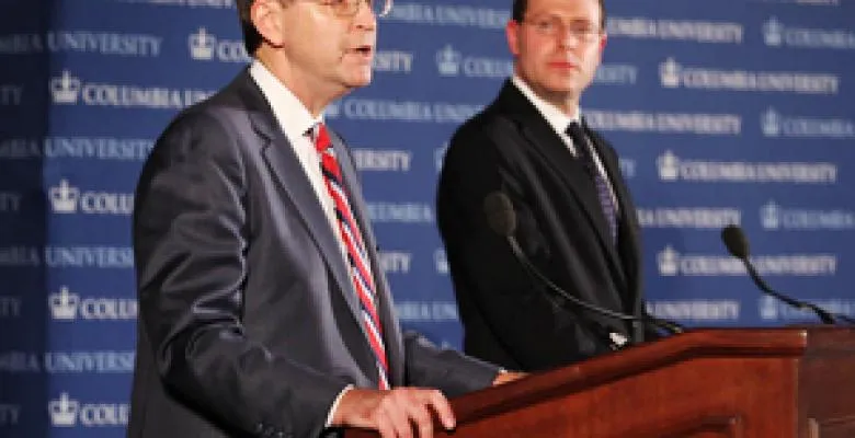 Dean Hubbard speaking at a podium