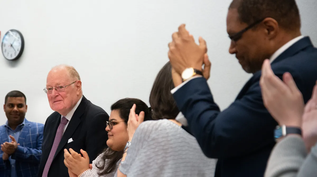 University Senate Members Applaud Outgoing Provost John C. Coatsworth at his last meetin.