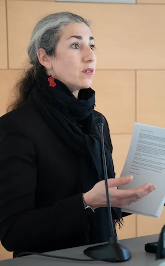 Faculty Affairs Committee member Nicole Wallack discusses a resolution to require up-to-date by-laws for Columbia's academic entities.. entities