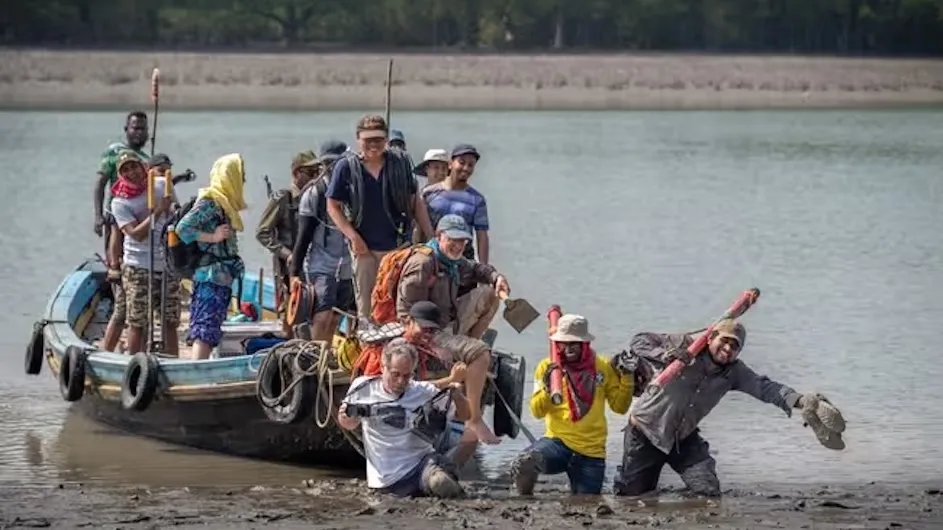 At low tide, the research team had to walk through thick mud to get to a field site in the Sundarbans mangrove forest.