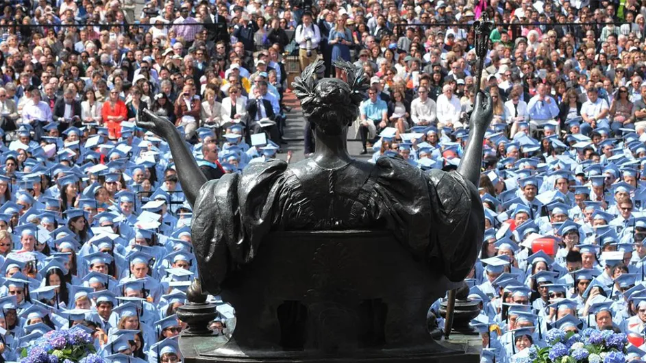 alma mater looks over a sea of students