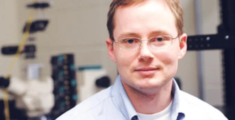 Electrical engineer Dirk Englund works on processing and transmission of data in the form of photons, the tiniest particles of light. Image credit: Eileen Barroso/Columbia University