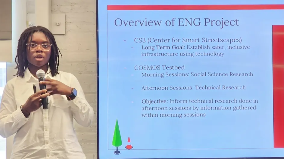 A student giving a presentation as part of the Engineering School's ENG program for rising high school seniors.