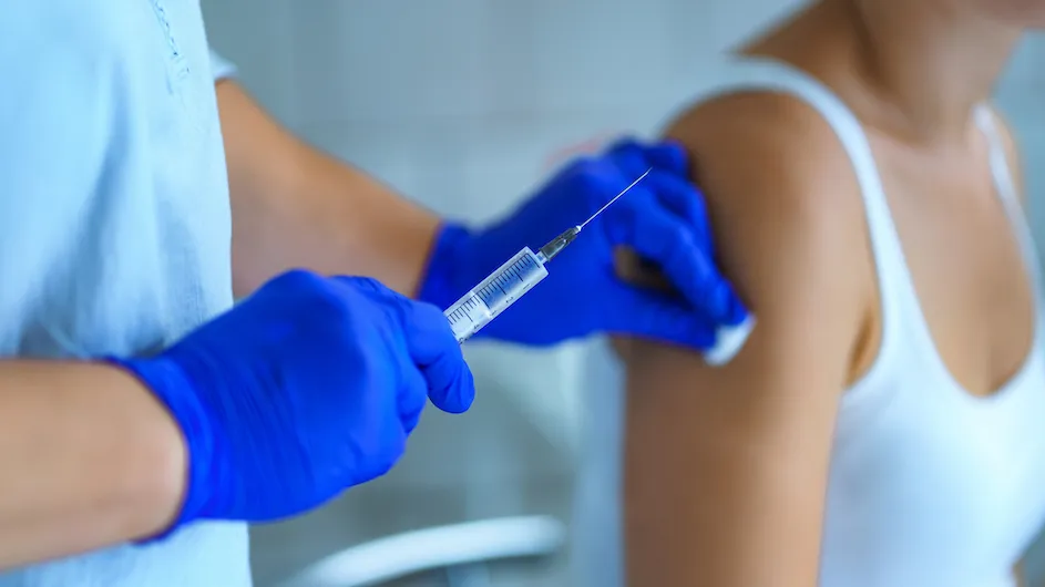 Stock image of person being vaccinated.