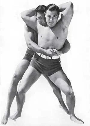black and white image of Pendleton in a 1930s publicity still while in a wrestling match