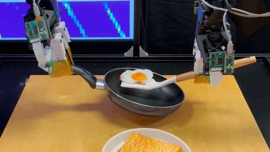 A robot cooks eggs.